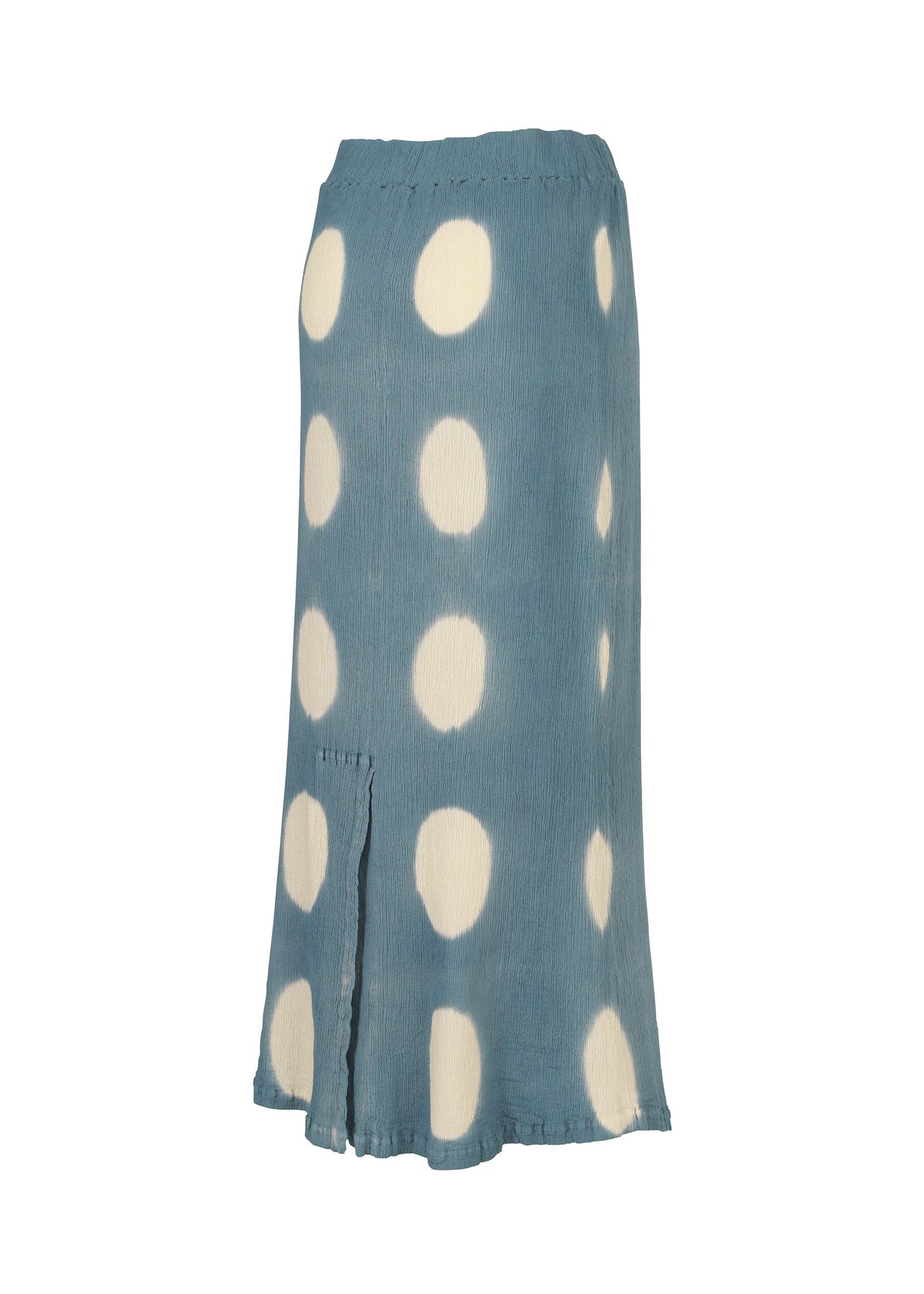 The HaaT KYO CHIJIMI ITAJIME is a blue, knee-length handcrafted skirt with large white polka dots, an elastic waistband, and a front slit near the hem. view 5 of 9