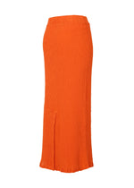 The KYO CHIJIMI MAY skirt by HaaT, shown on a white background, is bright orange with a crinkled texture, made from ultra-fine cotton yarn. It features a subtle front slit near the hem and a fitted waistband.