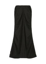 The HaaT TENMOKU COTTON is a long, black, garment-dyed textured skirt with a flared hem and gathered detailing, shown on a plain white background.