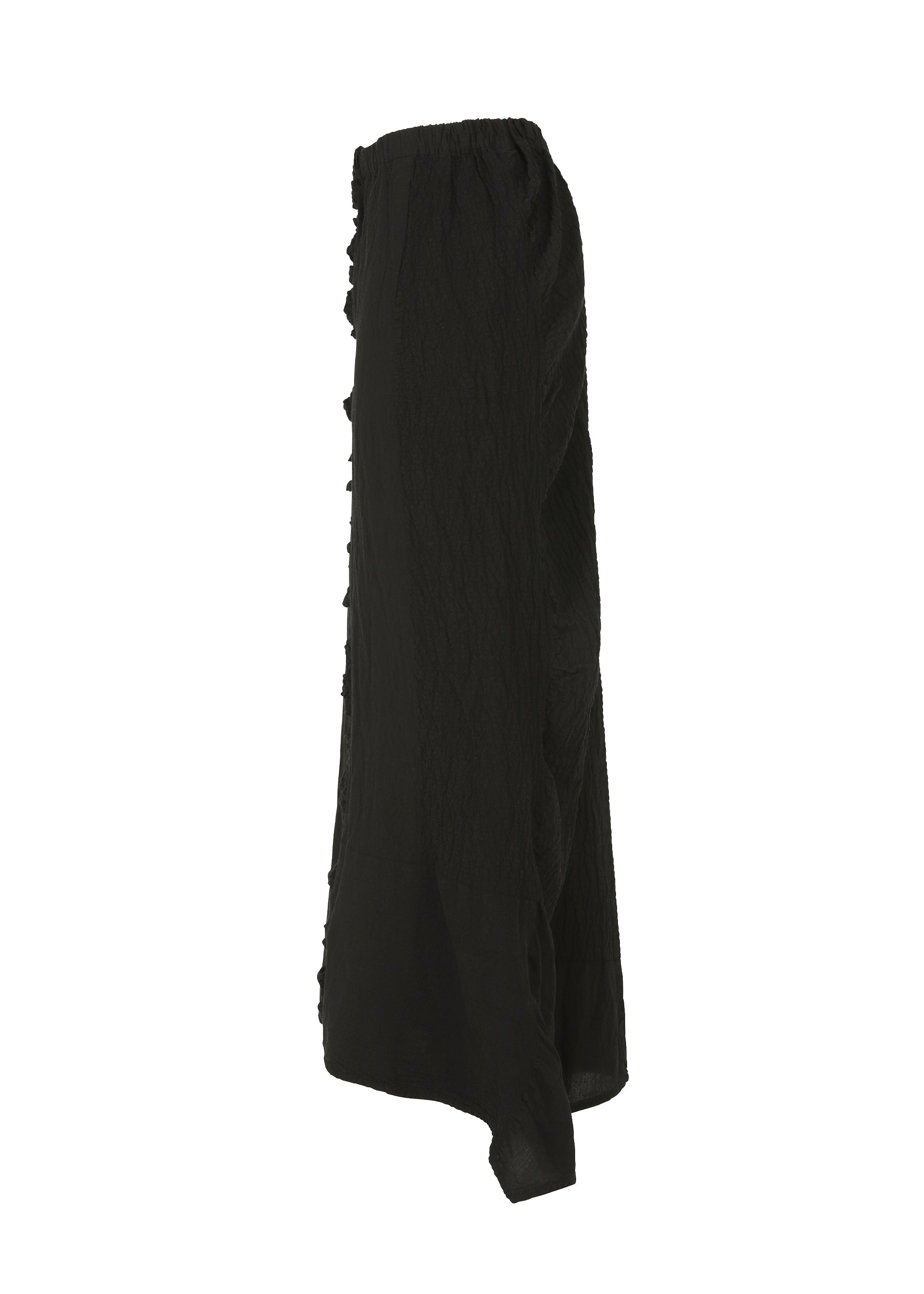 Zoomed view The TENMOKU COTTON skirt by HaaT is a long, black, garment-dyed textured piece with a subtle ruffled edge. Featuring a loose, flowy silhouette in lightweight fabric, it is shown against a white background.