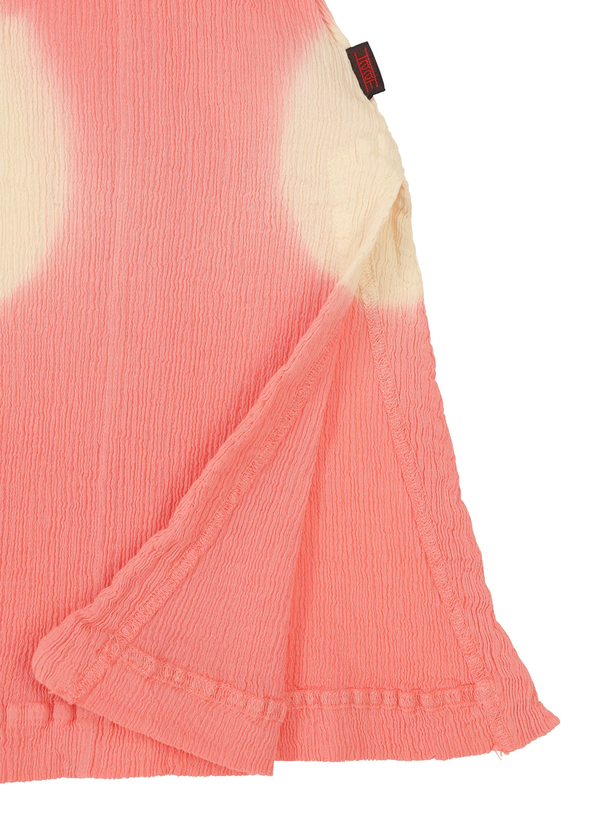 Zoomed view Close-up of the KYO CHIJIMI ITAJIME dress by HaaT: pink and cream crinkled fabric, visible seam, layered hem, and a small black-and-red tag highlight its fine craftsmanship.