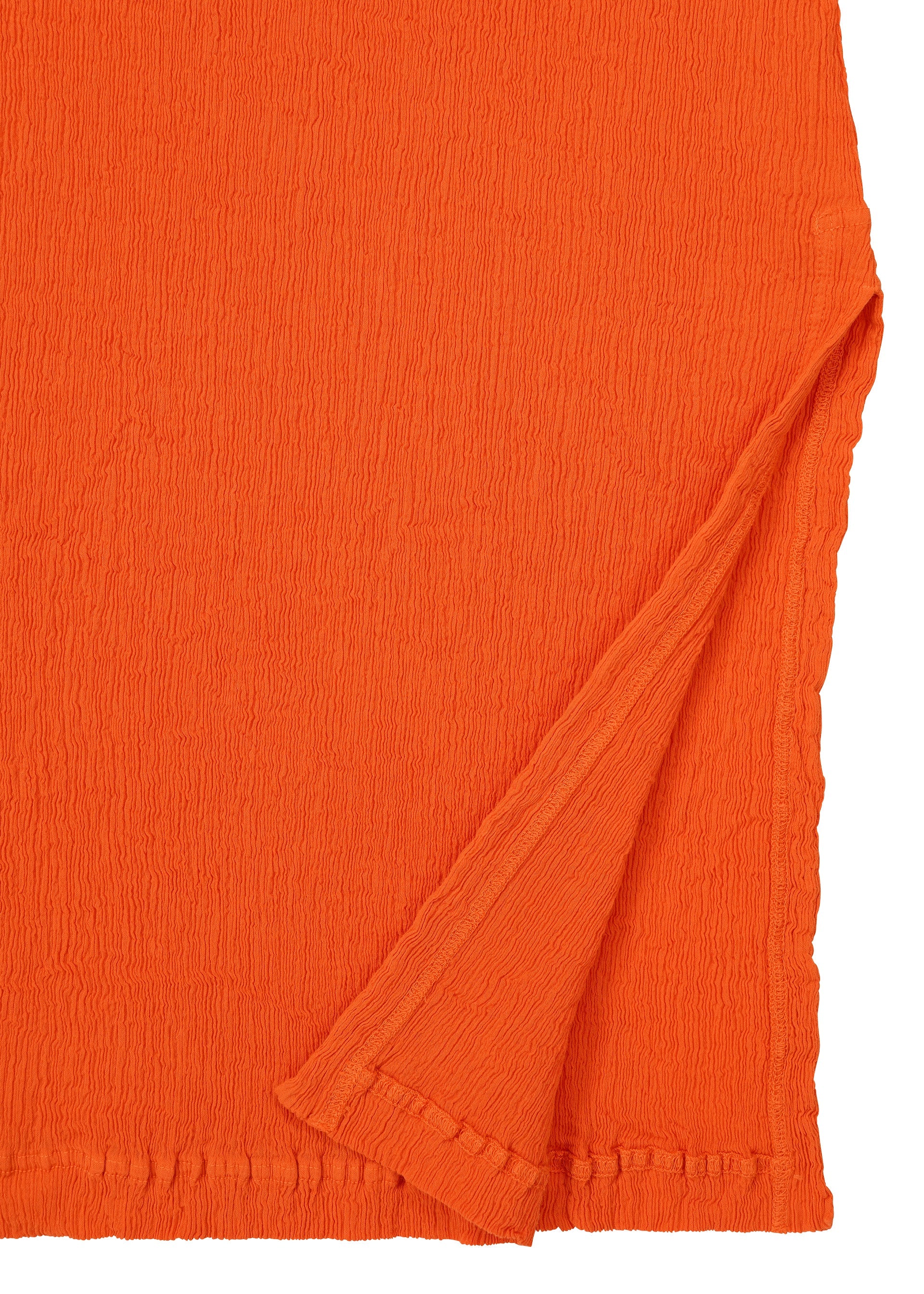 Zoomed view Vivid orange KYO CHIJIMI MAY by HaaT features ultra-fine cotton yarn with a light, supple feel, subtly crinkled texture, visible folded corner, and stitched hems—ideal for creating sleeveless dresses.
