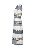 Side view of the HaaT KASANEGAKE midi dress, showcasing short sleeves, a layered design in blue and white stripes with frayed edges, tie waist, relaxed fit, and textured fabric for added style.
