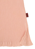 A close-up of KYO CHIJIMI FEBRUARY by HaaT shows light pink, crinkled fabric with a hem slit and a dark red side tag—ideal for an ultra-fine cotton round-neck top.