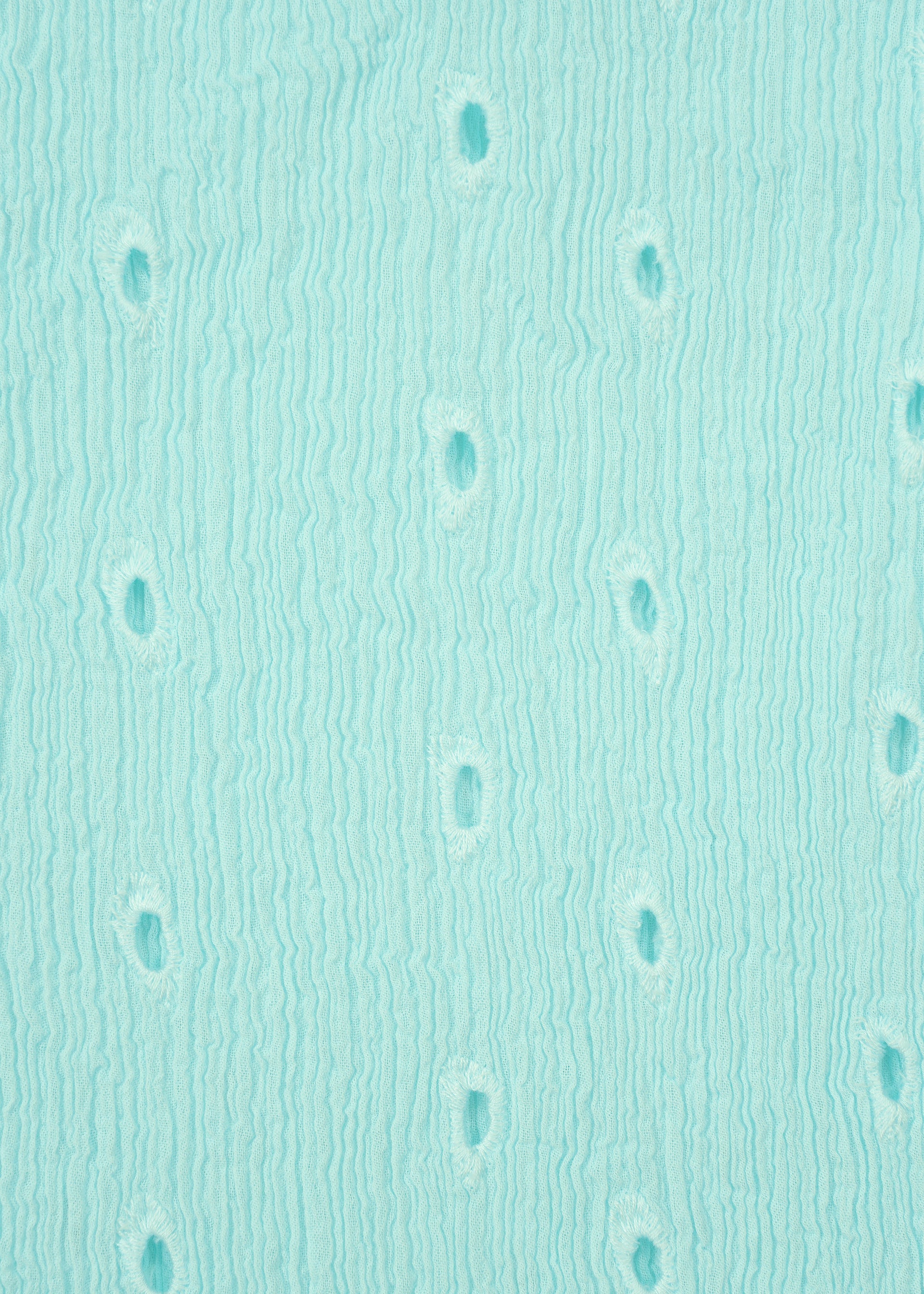 Zoomed view The KYO CHIJIMI TOBIKANNA CADEAU by HaaT features light blue textured fabric with vertical wavy lines and oval cutouts, inspired by Tobikanna embroidery—ideal for a lightweight women's top.