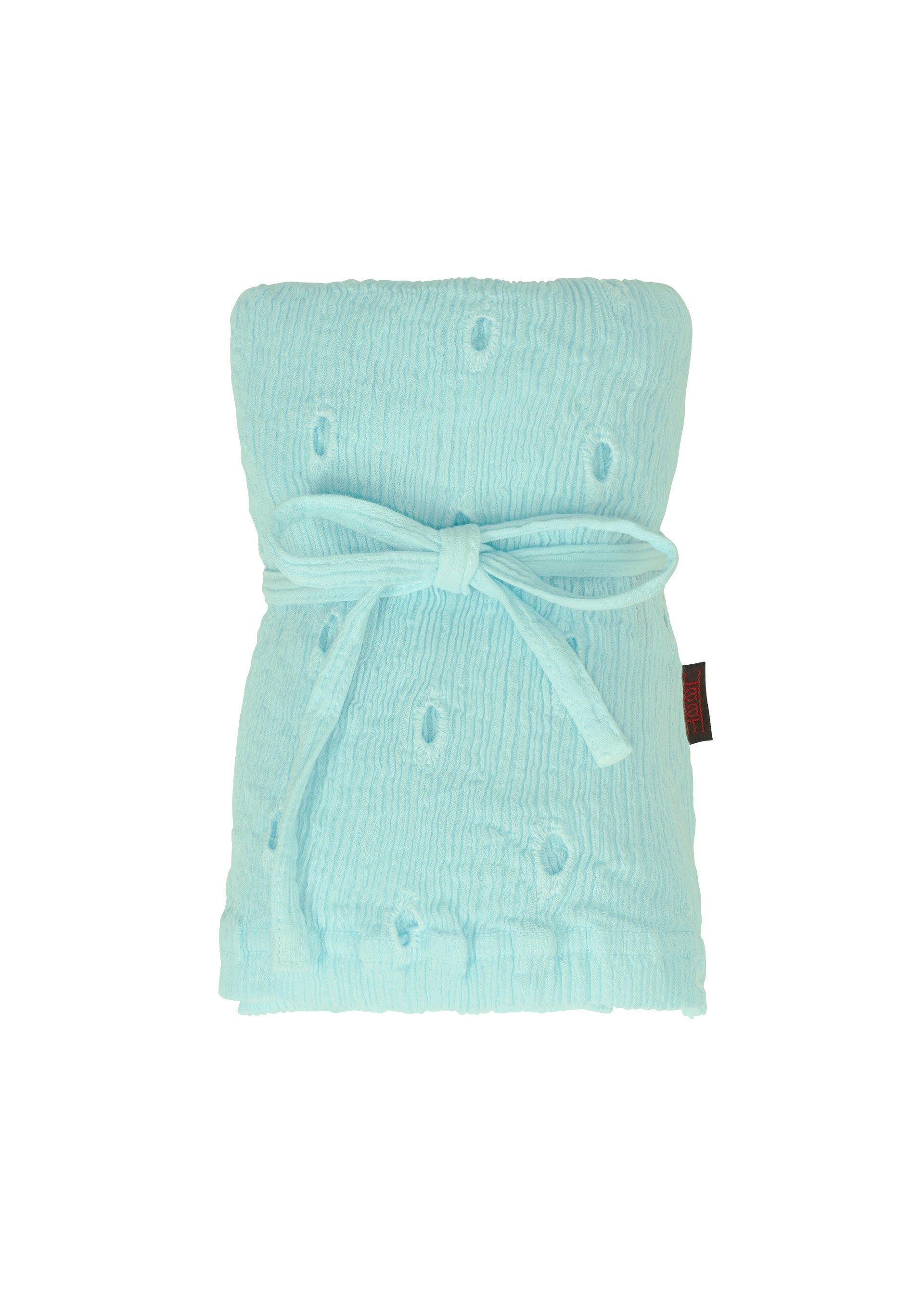 Zoomed view The HaaT KYO CHIJIMI TOBIKANNA CADEAU is a light blue textured blanket featuring a raised dot pattern, inspired by Tobikanna embroidery, neatly folded and tied with a matching fabric bow against a white background.