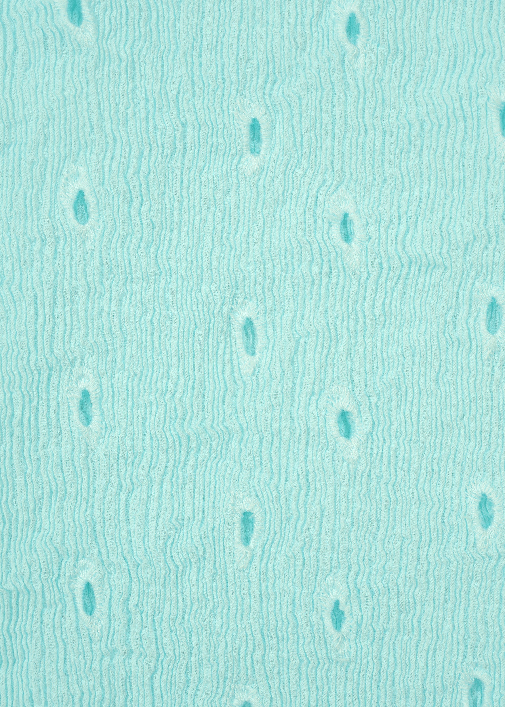 Zoomed view Light turquoise surface with a wavy, textured pattern and small oval indentations evokes Tobikanna embroidery or stylized ostrich leather, as seen on the HaaT KYO CHIJIMI TOBIKANNA CADEAU short-sleeve top.