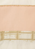 The HaaT KASANEGAKE top features jacquard weaving with a broad horizontal pink stripe, beige fringe borders, off-white panels, and a lower section adorned with beige accents and distressed details.