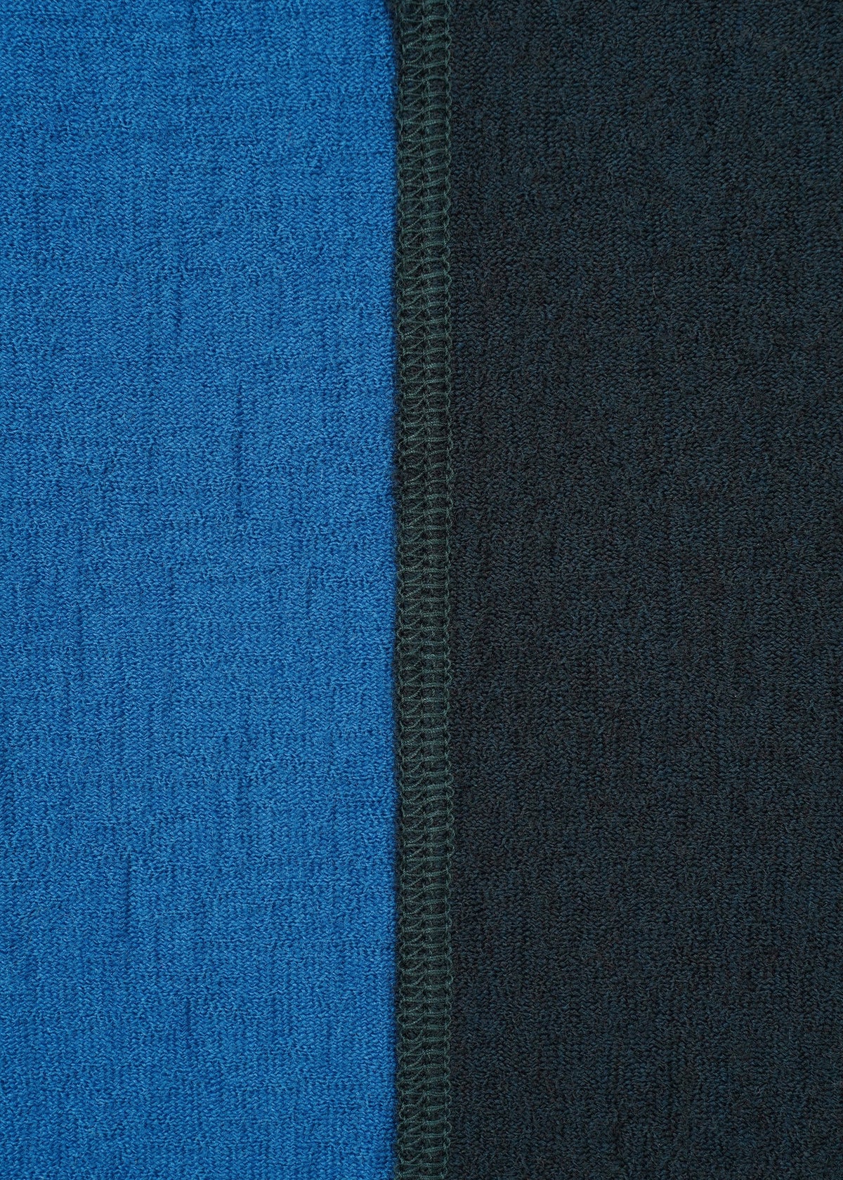 Close-up of two textured TRI COLOR WOOL jersey panels by HaaT, stitched vertically—blue on the left and black on the right—with a visible center seam. view 5 of 8