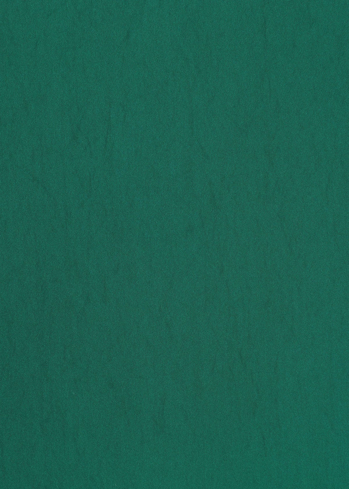 The NYLON STRETCH BOTTOM by HaaT features a flat, textured green surface with subtle uneven lines and shading, resembling durable stretch pants or felt fabric. view 5 of 8