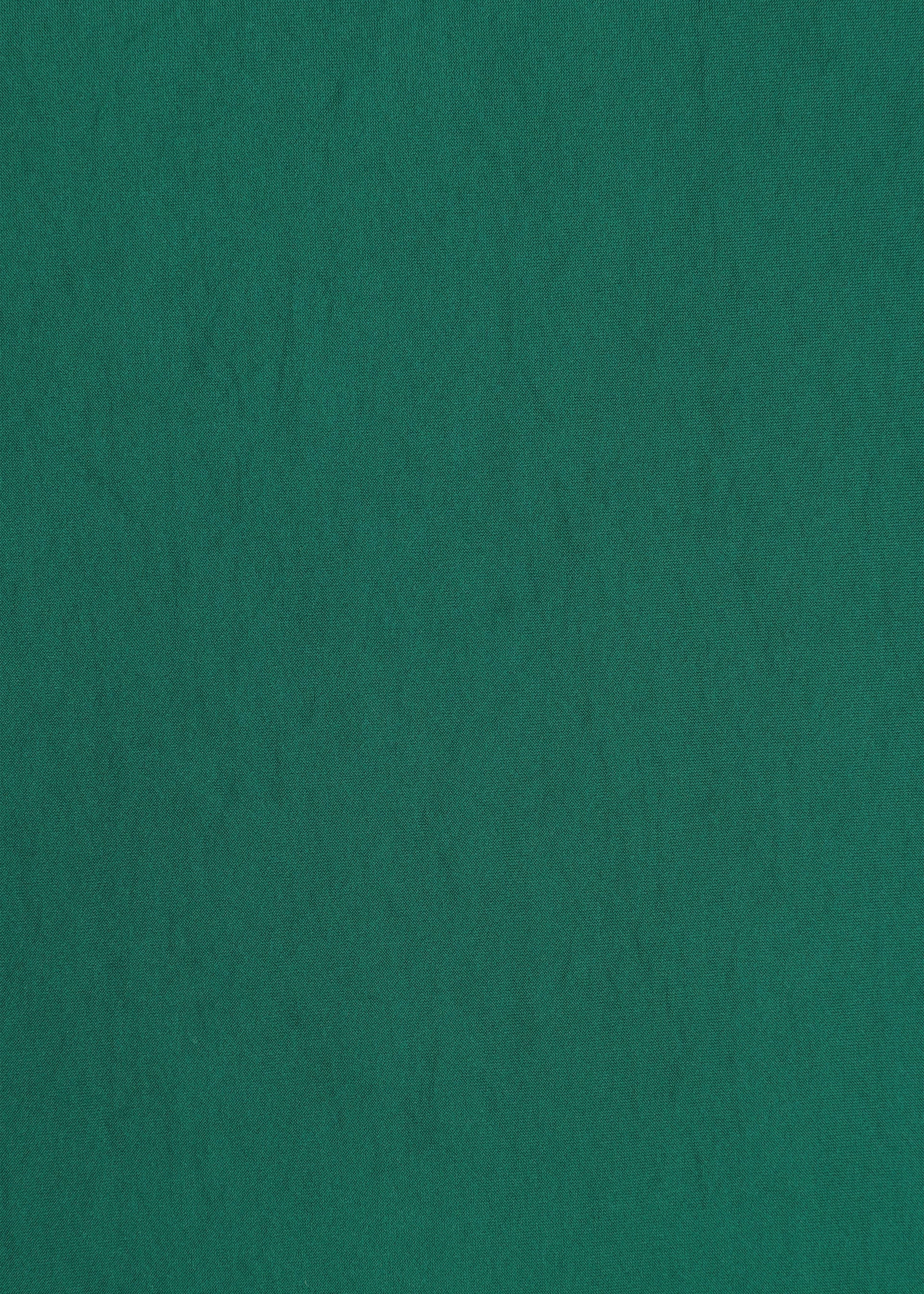 Zoomed view The NYLON STRETCH BOTTOM by HaaT features a flat, textured green surface with subtle uneven lines and shading, resembling durable stretch pants or felt fabric.