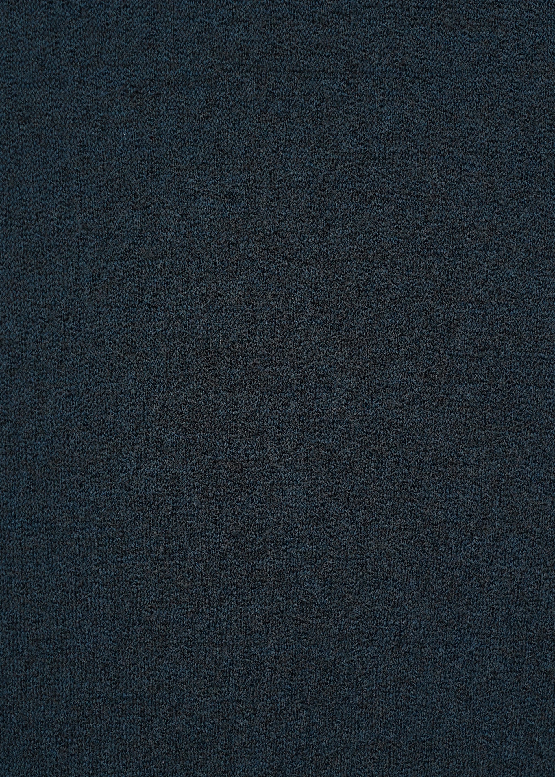 Zoomed view A close-up of the TRI COLOR WOOL top by HaaT in dark blue, highlighting the fine weave and textured detail of its merino wool material.