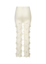 HaaT's ZIG ZAG KNIT pants are high-waisted, white knitwear with a textured geometric pattern and diamond-shaped details from knee to ankle.