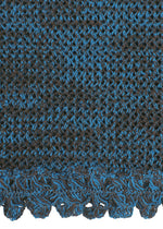 Close-up of the MELANGE MESH knit top by HaaT in black and blue organic cotton, featuring a textured pattern, mesh lace details, and a scalloped lace hem.