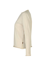 Side view of the HaaT PLATED LINES long-sleeve top in cream, made from lightweight organic cotton knit. Featuring a simple design with a crew neckline and no patterns, shown against a plain white background.