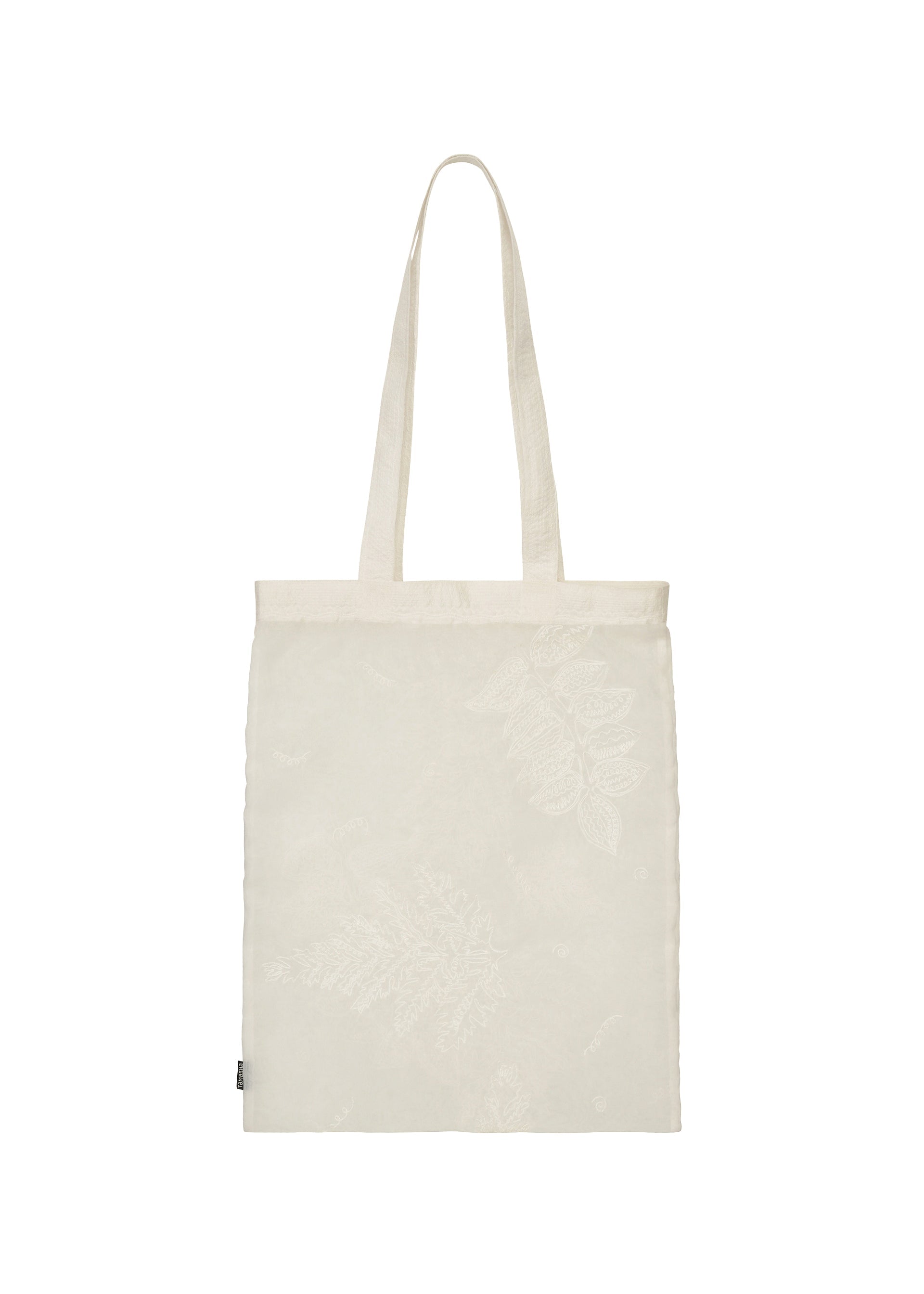 Zoomed view The GLASSLEAF TOTE JANUARY by HaaT is a cream-colored fabric tote bag with two handles, featuring a subtle Bhill-inspired leaf motif, shown against a white background.