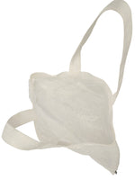 A top view of the empty, white, semi-transparent GLASSLEAF TOTE JANUARY by HaaT, featuring two handles and subtle floral and delicate leaf patterns on the fabric.