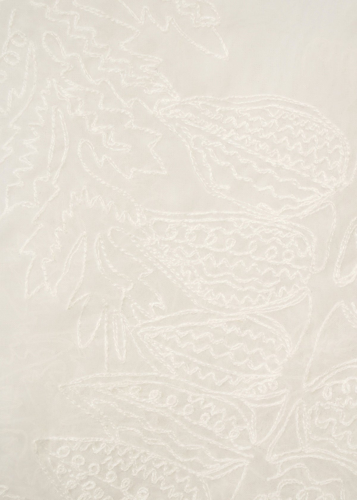 The GLASSLEAF TOTE JANUARY by HaaT features soft white fabric with raised embroidered abstract leaf motifs and wavy lines, adding subtle texture and elegance—ideal for refining your style. view 6 of 8