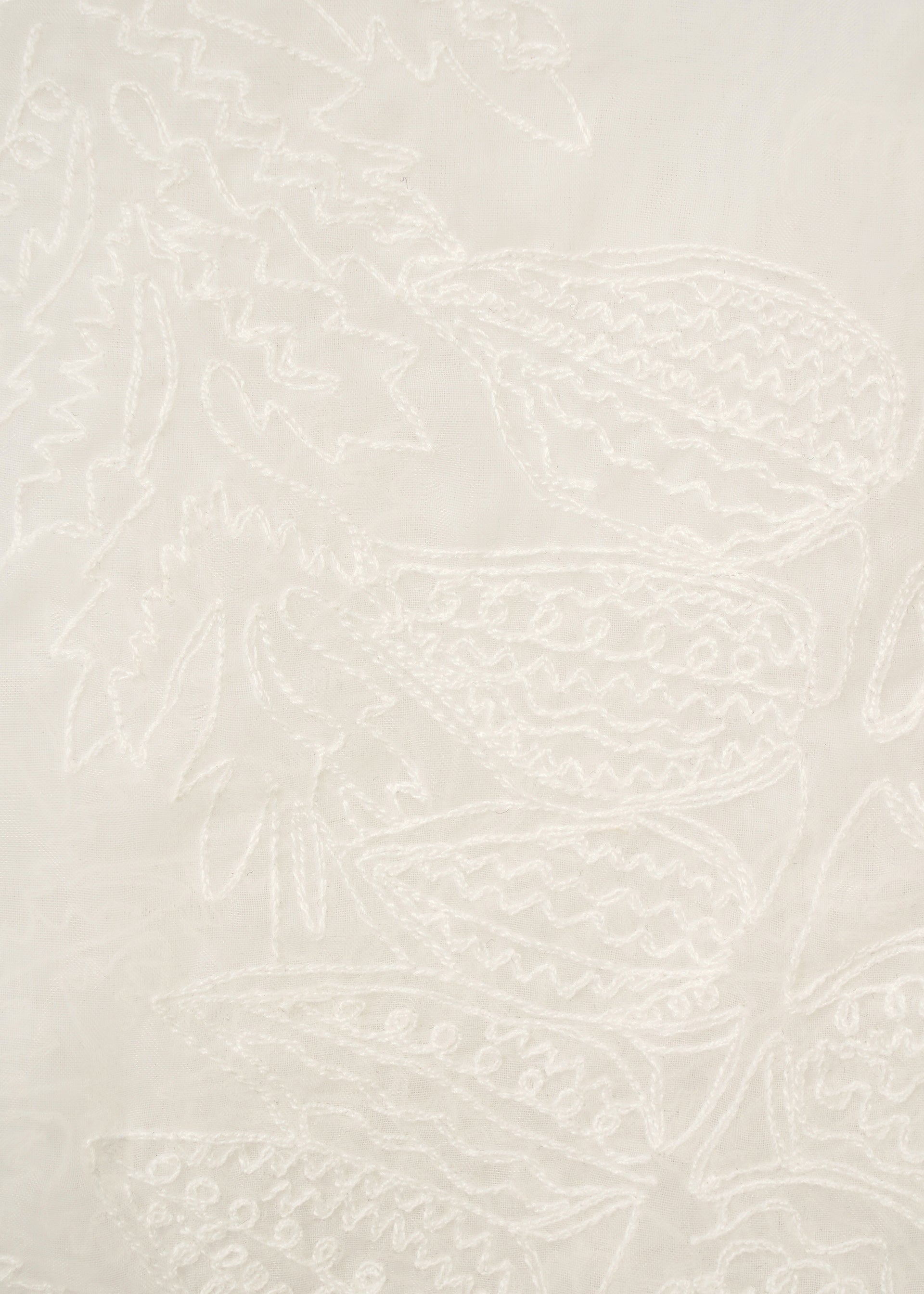 Zoomed view The GLASSLEAF TOTE JANUARY by HaaT features soft white fabric with raised embroidered abstract leaf motifs and wavy lines, adding subtle texture and elegance—ideal for refining your style.