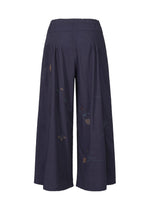 HaaT’s DAMI LEAVES are wide-leg, navy cotton pants featuring a high elastic waist and subtle Indian embroidery. The lightweight, gathered fabric creates a loose, flowy silhouette perfect for any occasion.