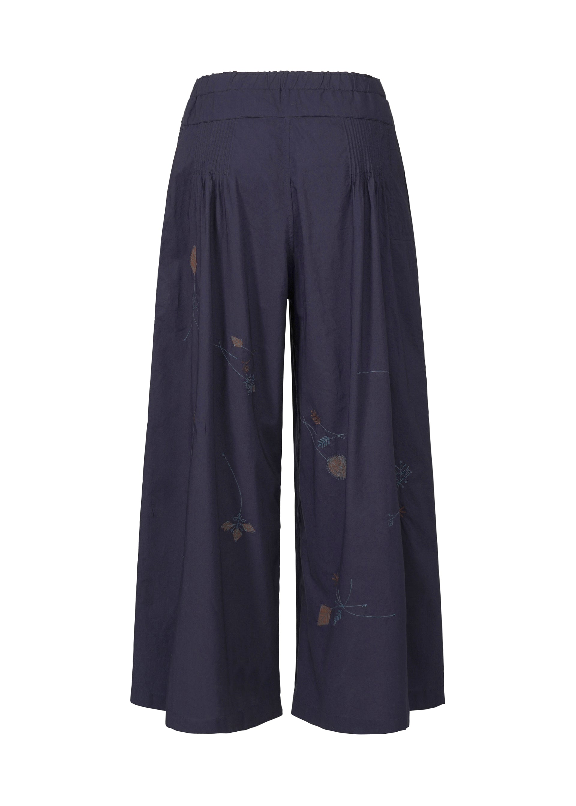 Zoomed view HaaT’s DAMI LEAVES are wide-leg, navy cotton pants featuring a high elastic waist and subtle Indian embroidery. The lightweight, gathered fabric creates a loose, flowy silhouette perfect for any occasion.
