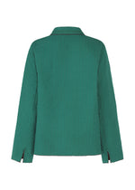 The DUAL LAYER jacket by HaaT is a green, handwoven, quilted cotton piece shown from the back with long sleeves, a collar, vertical stitching, and small slits on the sleeve cuffs.