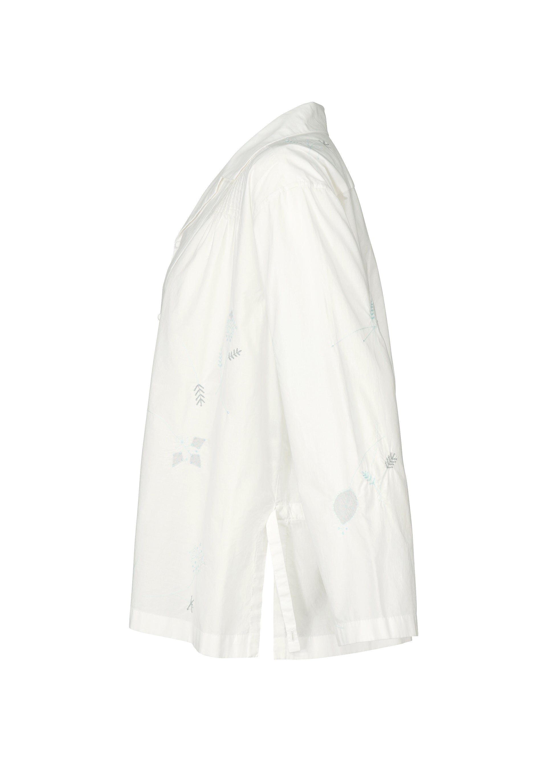 Zoomed view Side view of the white DAMI LEAVES long-sleeve shirt by HaaT, with a collar, light blue Chikan embroidery, and side slit at the hem, photographed against a plain white background.
