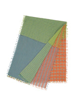 The TRIPLY SQUARE STOLE by HaaT features a bold green, blue, and orange check pattern with hand-finished fringes. Made from lightweight silk-wool, its colors appear in large divided sections. - MULTI （no.99）