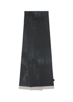 The HaaT WALL WHITE HEM is a long, dark gray chiffon stole featuring a subtle uneven Nassen print and a light gray border at one end, shown laid flat on a white background. - GRAY （no.12）