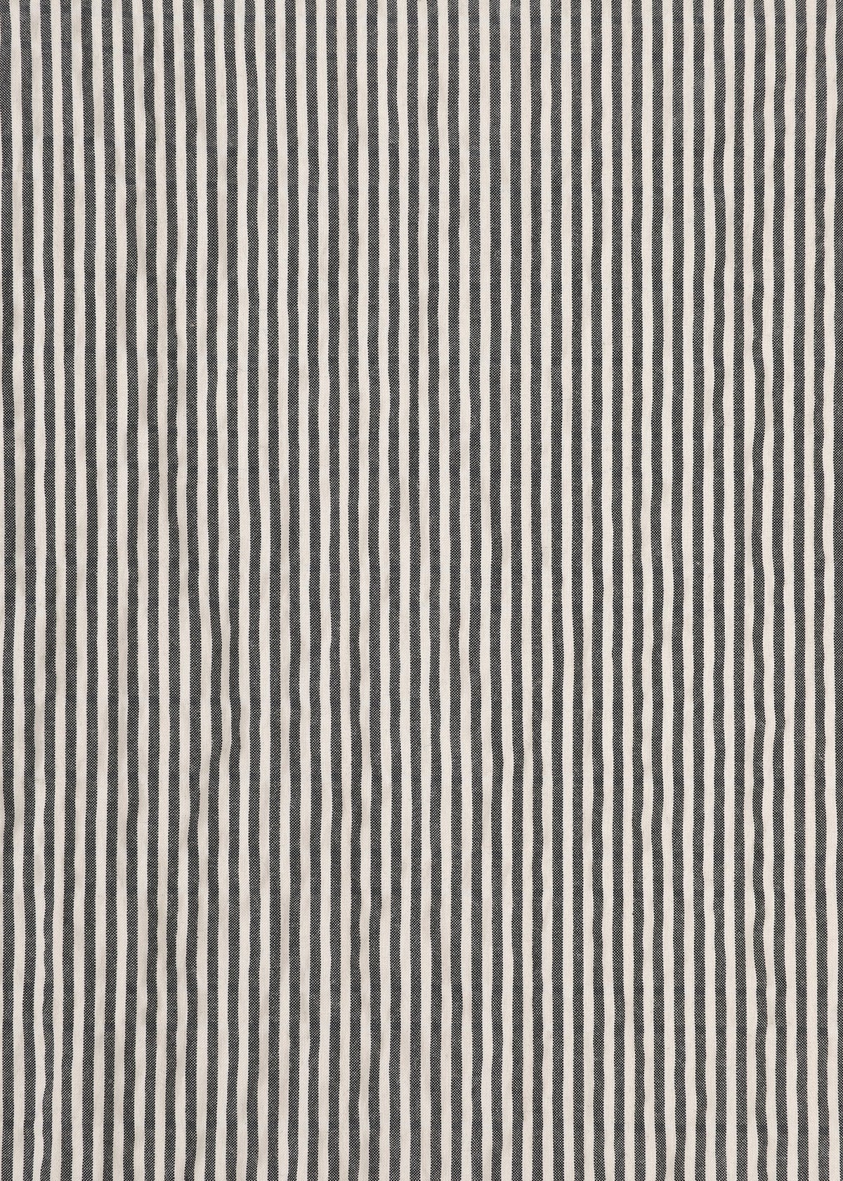 Wavy black and white vertical stripes in an irregular, hand-drawn style form a textured pattern across the surface, evoking the signature stretch of classic seersucker pants—this is RIPPLE STRIPE by HaaT. view 5 of 8