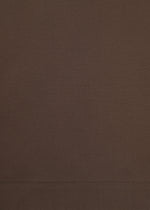 A close-up view of the smooth, brown COTTON STRETCH BOTTOM by HaaT, crafted from extra-long-staple cotton and featuring a horizontal stitched seam near the bottom of the image.