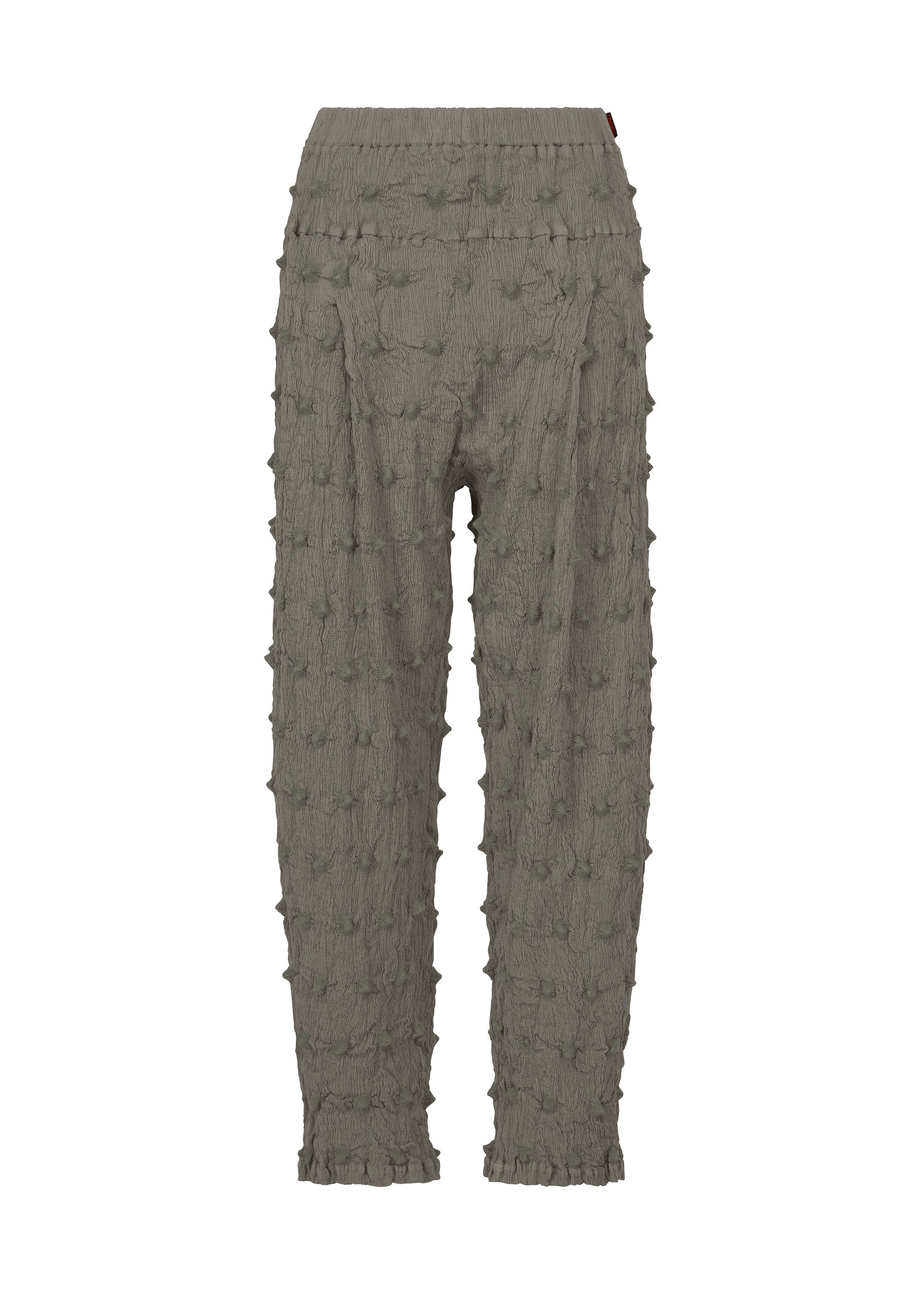 Zoomed view HaaT’s KYO CHIJIMI SQUARE EMB pants in gray feature a crinkled, textured fabric with raised, bumpy square embroidery throughout. Designed with an elastic waistband, these pants offer a relaxed fit and slightly tapered legs. - MIDDLE GRAY （no.11）
