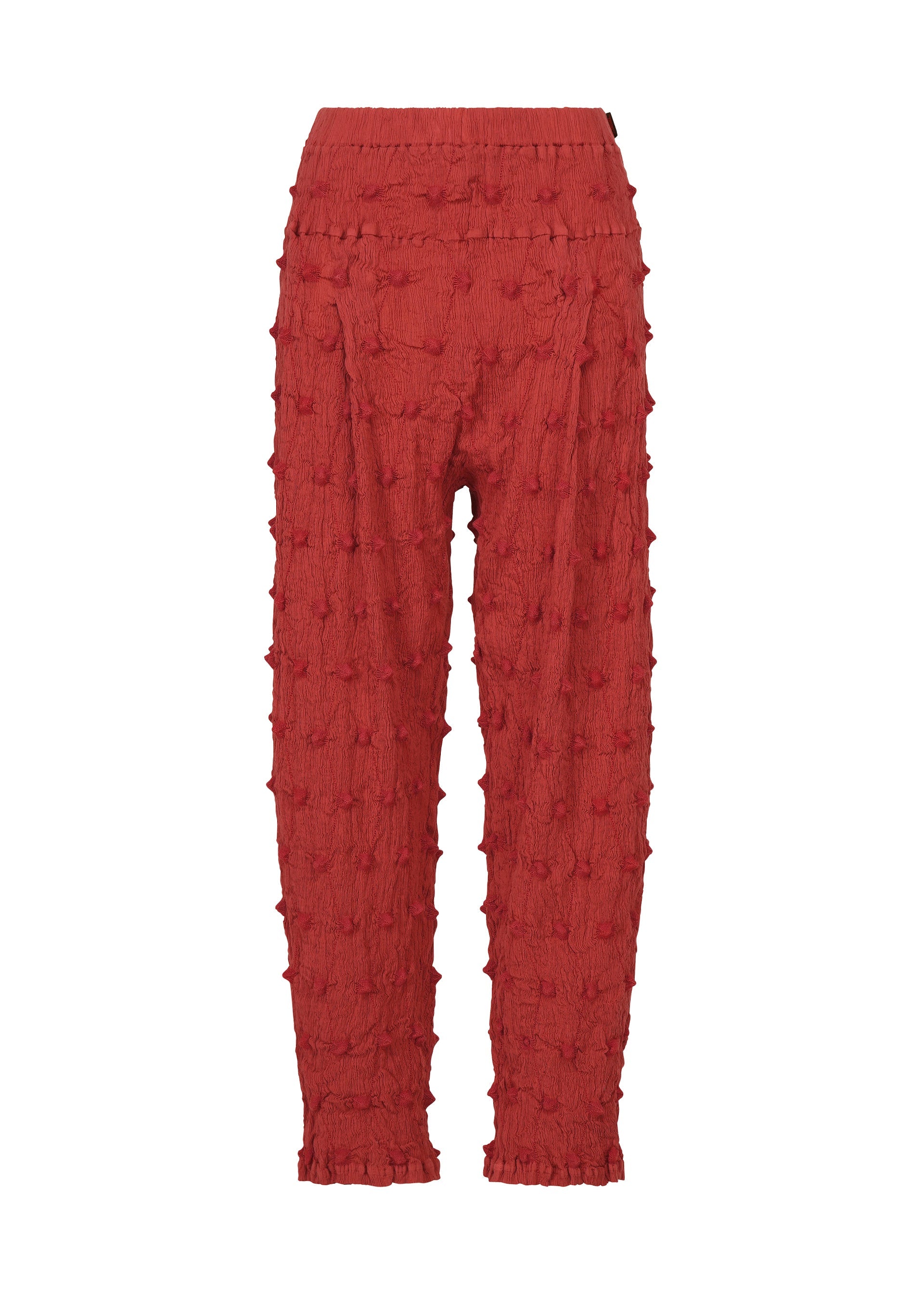 Zoomed view Crafted by HaaT, the KYO CHIJIMI SQUARE EMB pants feature a bold red hue and an ankle-length, high-waisted silhouette. These pants showcase an all-over raised, tufted dot motif that evokes the distinctive crinkled texture of classic KYO CHIJIMI styles. With a relaxed fit and a seamless appearance free of visible fasteners, they combine modern dimension with timeless appeal. - RED （no.24）