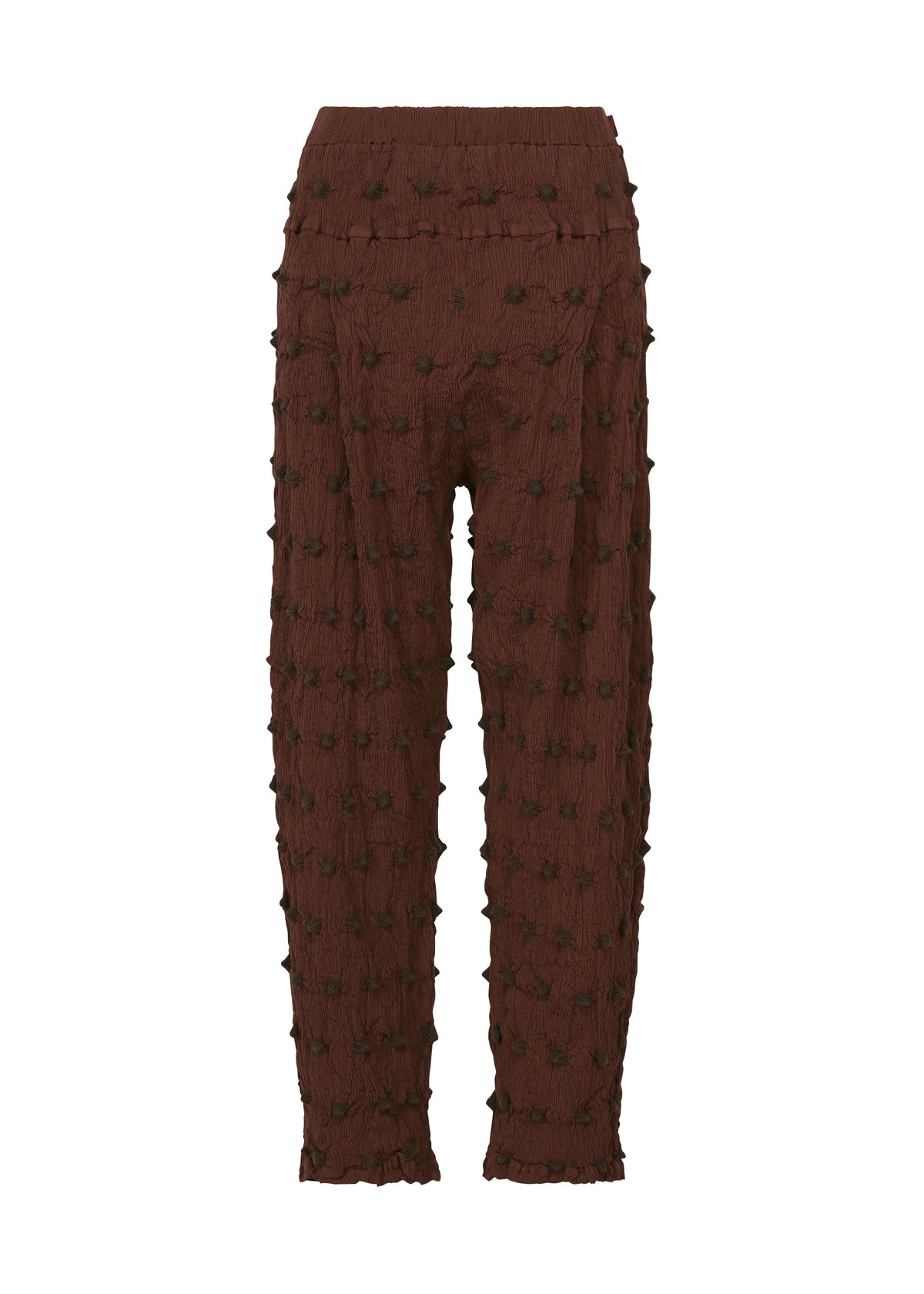 The HaaT KYO CHIJIMI SQUARE EMB pants in brown feature a high waist, straight-leg silhouette, and a distinctive crinkled texture accented with raised square tufts embellishing the entire fabric, displayed against a plain white background. view 3 of 9