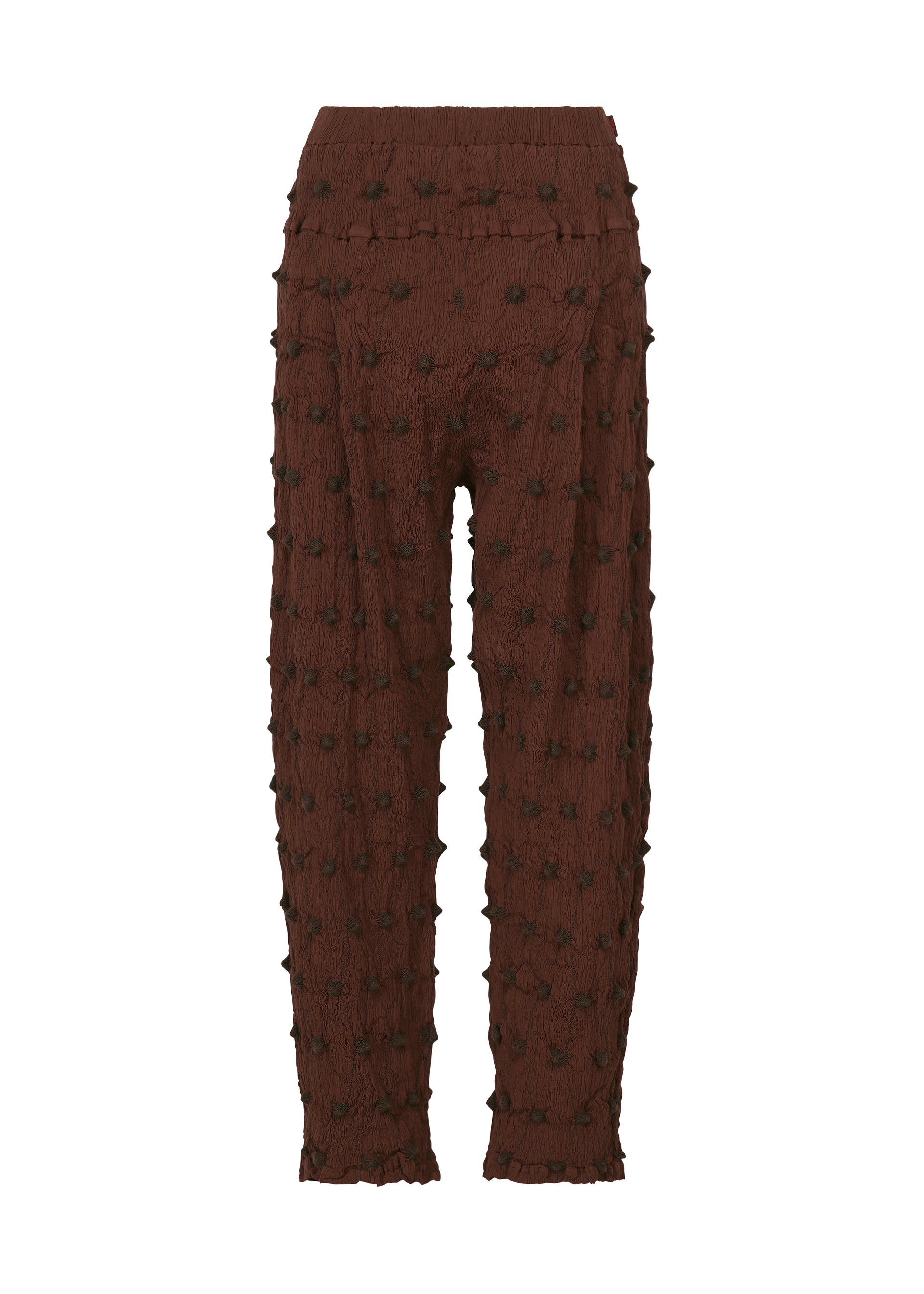 Zoomed view The HaaT KYO CHIJIMI SQUARE EMB pants in brown feature a high waist, straight-leg silhouette, and a distinctive crinkled texture accented with raised square tufts embellishing the entire fabric, displayed against a plain white background. - BORDEAUX （no.84）