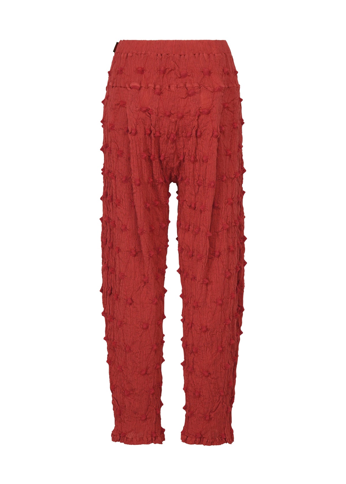The KYO CHIJIMI SQUARE EMB pants by HaaT feature a striking red color with an elastic waistband, raised bumpy details across the fabric, a distinctive crinkled texture, and subtle square-pattern embroidery, all showcased on a white background. view 4 of 9