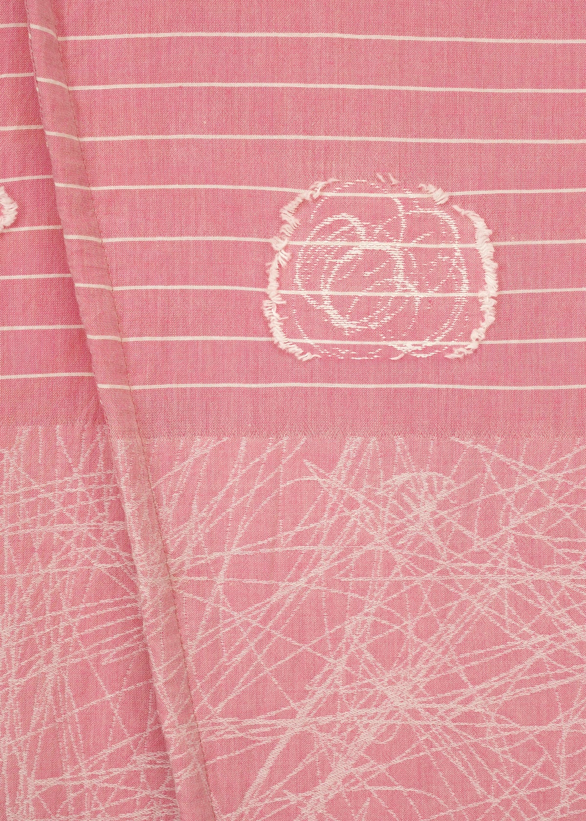 Close-up of pink fabric with horizontal white stripes, a square embroidered pattern, and abstract white lines, echoing the unique textures of HaaT's ONE STROKE DRAW wide jacquard pants with an adjustable silhouette. view 4 of 7