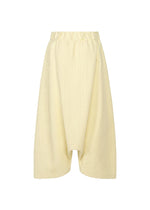 The SAKIORI by HaaT are light yellow woven sarouel shorts with a textured finish and elastic waistband, shown on a white background.