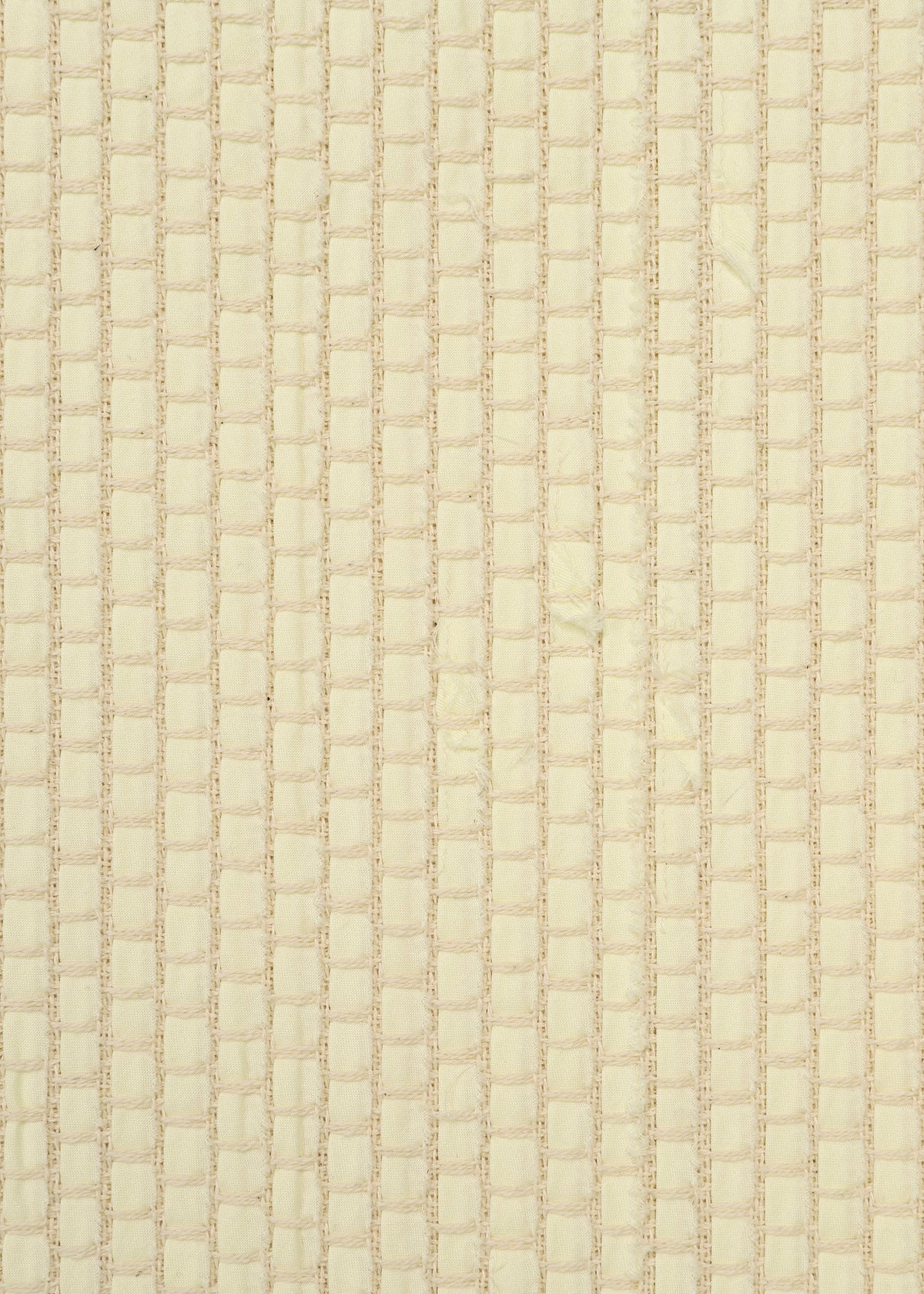 Close-up of SAKIORI by HaaT: beige woven fabric with a grid pattern, forming small rectangles. The texture is soft, quilted, and slightly raised. view 7 of 10