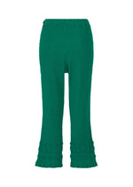 The HaaT KYO CHIJIMI TSUCHIKABE pants feature a green textured design with an elastic waistband, slightly flared legs, and ruffled hems. Crafted from ultra-fine cotton for a crepe-like feel, they are shown against a plain white background.