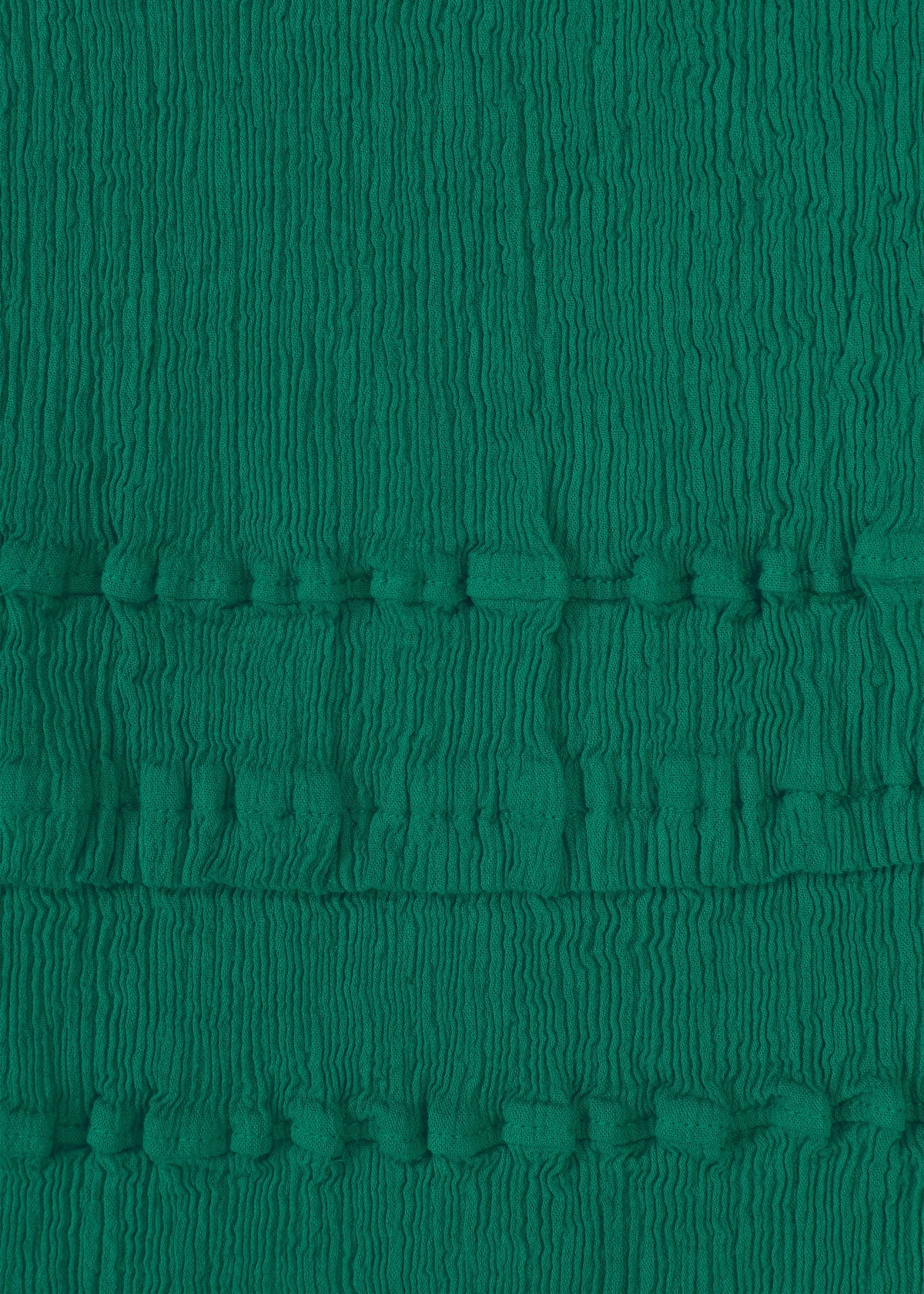 Close-up of green textured KYO CHIJIMI TSUCHIKABE fabric by HaaT, with vertical crinkles and two horizontal bands of small, evenly spaced raised bumps. Made from ultra-fine cotton for a crepe-like feel, reminiscent of KYO CHIJIMI pants. view 6 of 9