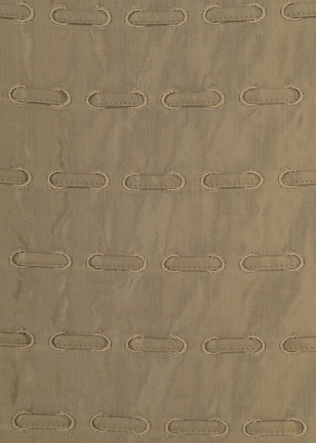 HOLE & LINE by HaaT features a soft beige fabric with subtle vertical ridges, adorned with evenly spaced horizontal oval stitched holes that create a grid-like pattern reminiscent of eyelet embroidery. view 5 of 8