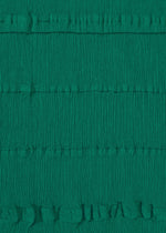 A close-up of teal, textured fabric by HaaT, featuring horizontal ruching and gathers. The KYO CHIJIMI TSUCHIKABE design creates a wrinkled, pleated surface reminiscent of signature KYO CHIJIMI style.