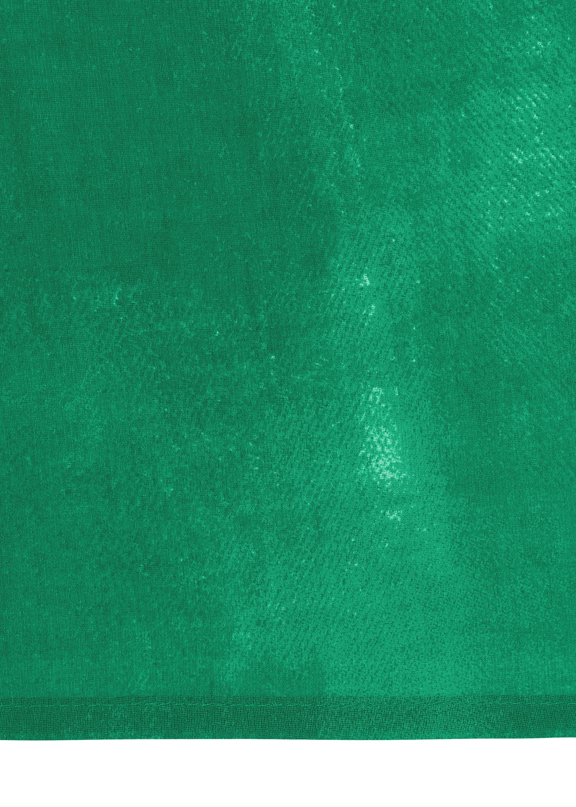 Zoomed view A close-up of WALL WHITE HEM by HaaT reveals green textured fabric with a distinct border and varied green shades, evoking Kyoto dyeing techniques.