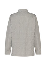 The RIPPLE STRIPE shirt by HaaT is a unisex, long-sleeved button-up made from seersucker fabric with vertical black and white stripes. Shown from the back, it features a collar and a yoke across the shoulders.