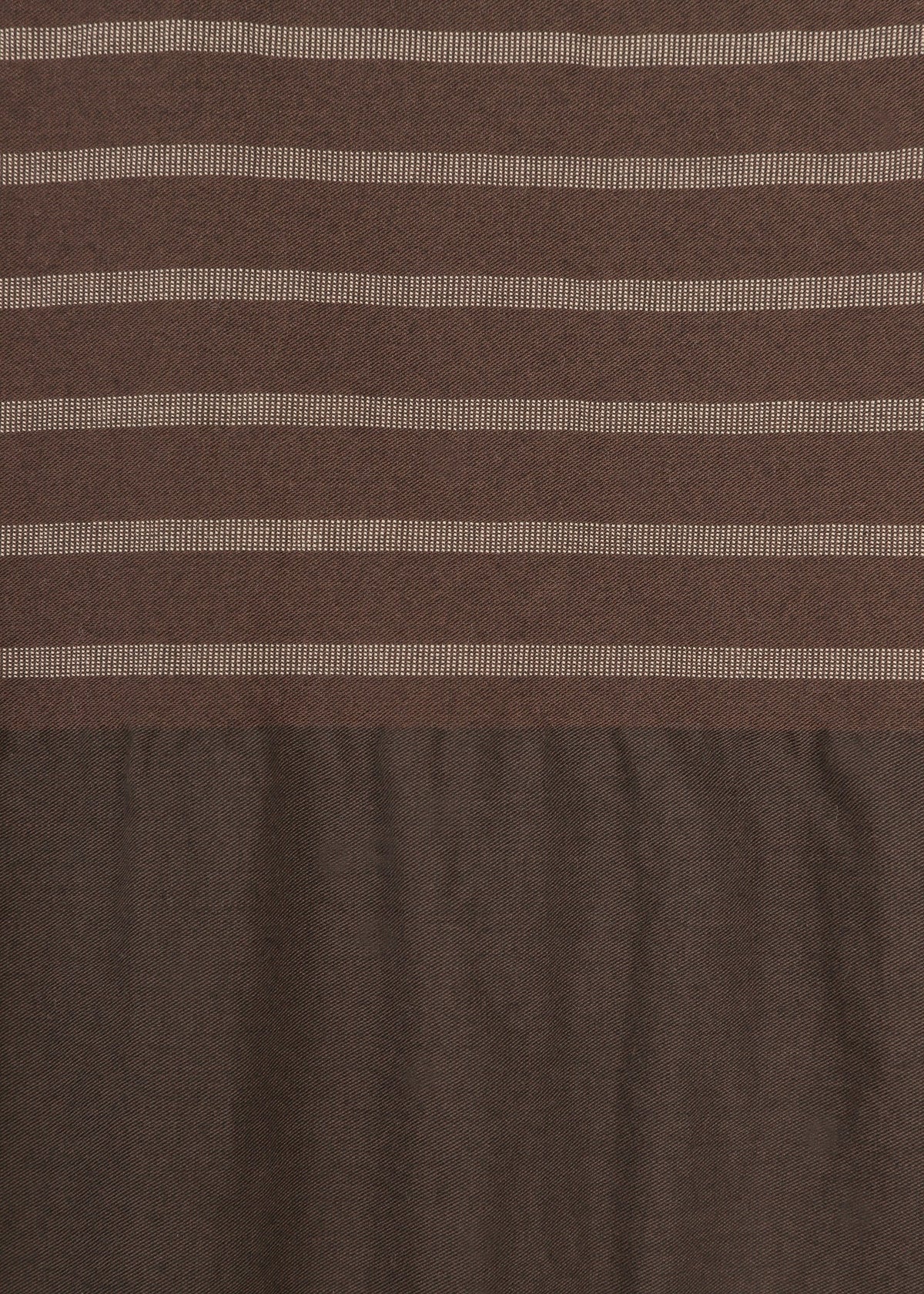 COLLAGE STRETCH Ⅱ by HaaT is crafted from brown fabric with a relaxed silhouette, showcasing horizontal light beige stripes on the upper section that evoke the look of a striped short-sleeved top, while the lower section transitions to a solid brown with a gently wrinkled texture. view 5 of 8
