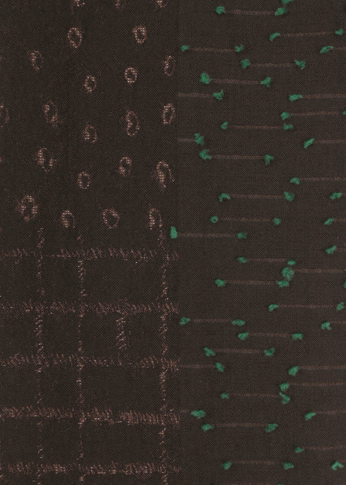 Close-up of HaaT’s COLLAGE STRETCH Ⅰ fabric in dark brown, featuring three jacquard-inspired stitched patterns: brown circles, a check-like brown grid, and scattered green dots—each arranged in vertical side-by-side sections. view 5 of 8