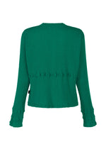 Back view of the HaaT KYO CHIJIMI TSUCHIKABE blouse in green, made from ultra-fine cotton with a crepe-like texture, horizontal ruffle details at the waist and cuffs, and textured fabric for comfort.