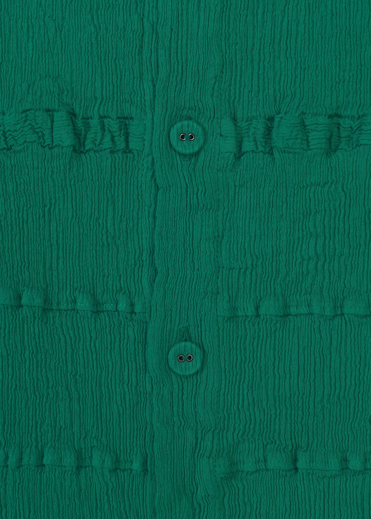 Close-up of KYO CHIJIMI TSUCHIKABE by HaaT: ultra-fine cotton green fabric with a crepe texture, vertical row of two buttons, and subtle grid pattern formed by horizontal stitched lines. view 5 of 8
