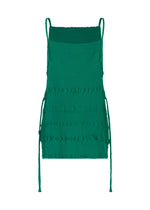 The KYO CHIJIMI TSUCHIKABE by HaaT is a green, sleeveless apron-style top with thin straps, side ties, and a square neckline. Made from ultra-fine textured cotton for a crepe-like feel, it is shown against a white background.